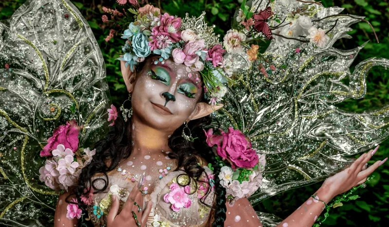 woman dressed to look like a sleeping fantasy fairy